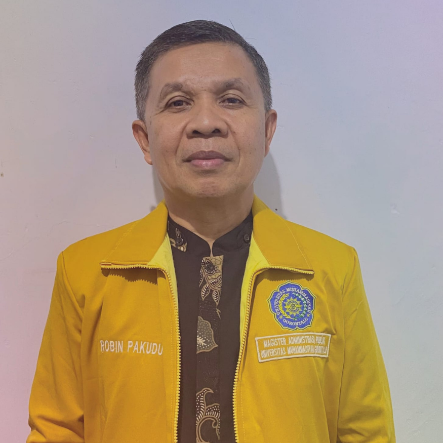Dr. Robin Pakudu, M.Si​